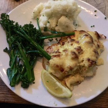 Michael's Cafe - Stuffed shrimp with mashed potatoes and broccolini. Everything but broccolini would have been good if it didn't come out cold twice. - American Near Me - Timonium, Maryland
