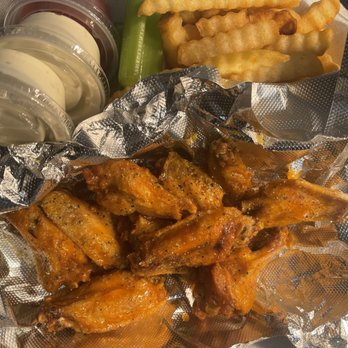 Juju’s Wings On Wheels - a tray of food - Chicken Wings Near Me Juju’s Wings On Wheels - a tray of food - Chicken Wings Near Me