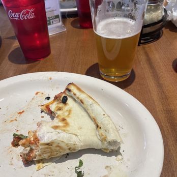 Windy City Pizza and Pub - NY slice with capicola, feta, basil, and red pepper flakes. Soooo thin, sooooo crispy. - Pizza Near Me - Breckenridge, Colorado