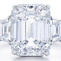 Sublime Diamonds - Three stone ring with Emerald cut center diamond and step cut trapezoid side diamonds