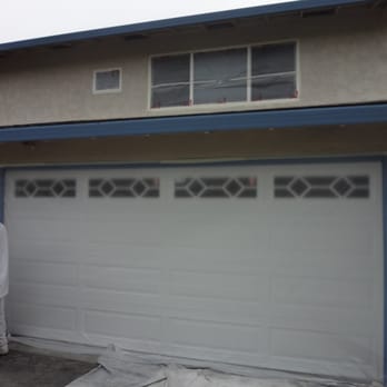Valley Painting - Prepping - Garage door and windows covered - Painters Near Me Valley Painting - Prepping - Garage door and windows covered - Painters Near Me