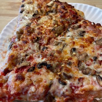 Avalanche Pizza - two slices of pizza on a paper plate - Pizza Near Me - Whistler, British Columbia