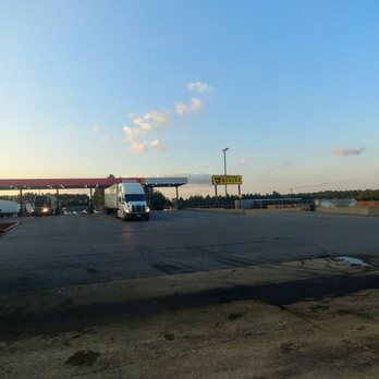ONE9 Travel Center - backview of the building fuel islands and down below the parking lot - Gas Stations Near Me - Cottondale, Alabama