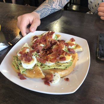GVA Cafe - Avocado toast with hard boiled egg, add bacon, on sourdough bread. - Cafes Near Me - Morgan Hill, California GVA Cafe - Avocado toast with hard boiled egg, add bacon, on sourdough bread. - Cafes Near Me - Morgan Hill, California