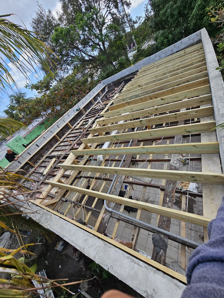 Slide of Sarmiento Roofing Services