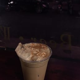 Maude's iced coffee with pleasant view of the downtown Gainesville street Maude's iced coffee with pleasant view of the downtown Gainesville street