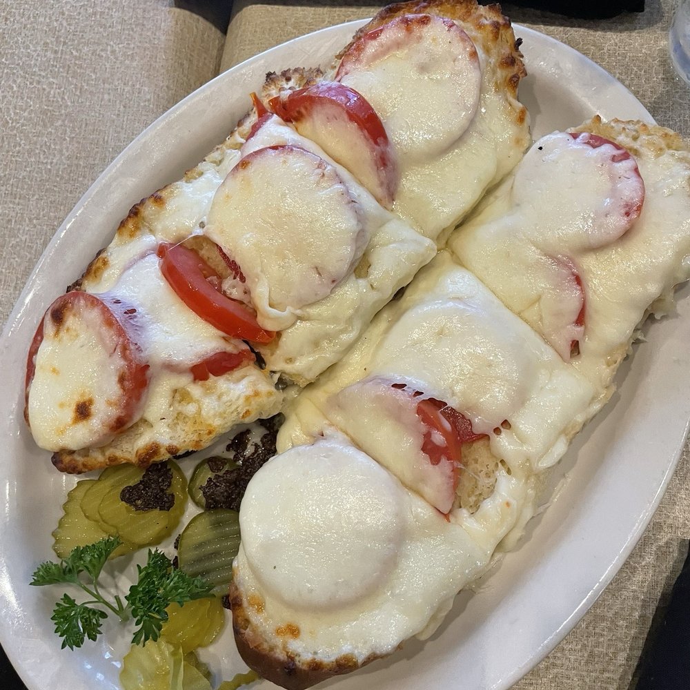Capparelli's On Main - tomato and cheese bread - Italian Near Me - San Antonio, Texas Capparelli's On Main - tomato and cheese bread - Italian Near Me - San Antonio, Texas