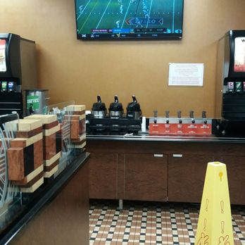 Arby's - Catchin a little college football. Sauce station below. - Fast Food Near Me - Fresh Meadows, New York