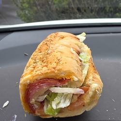 This whole sandwich could fit in one hand my hand could fit all the way around the sandwich and I do not have big hands.