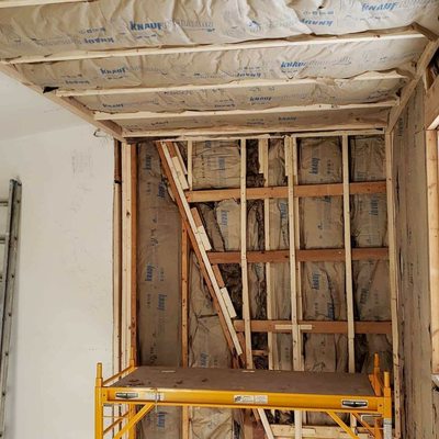 Immaculate Construction & Home Improvement Services Logo