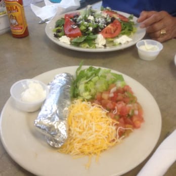 Keys Bite - Top - Mediterranean salad bottom- tortilla, lettuce, tomato, cheese - American Near Me - Key Largo, Florida