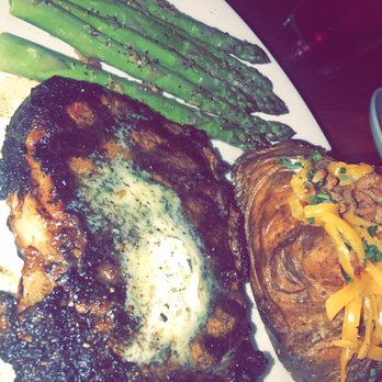 Stoney River - My meal : Ribeye , loaded  baked potatoes, asparagus . The asparagus was so well seasoned like none i'd ever had before. - Steakhouses Near Me - Annapolis, Maryland