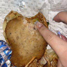 Raw chicken sandwich, in the center Raw chicken sandwich, in the center