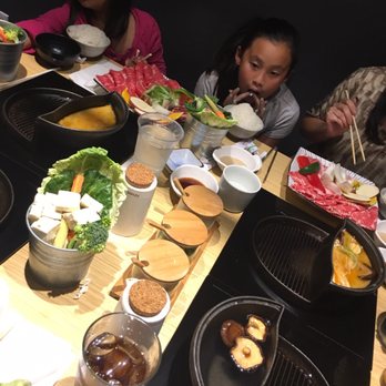 Halves Boiling Pot + Grill - A busy table of hungry people - Japanese Near Me - Foothill Ranch, California Halves Boiling Pot + Grill - A busy table of hungry people - Japanese Near Me - Foothill Ranch, California