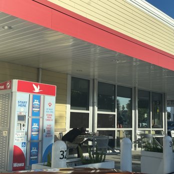 Wawa - Homeless guy sleeping on a table. Not the thing you wanna see when you're coming there to get something to eat. - Gas Stations Near Me - Fort Myers, Florida