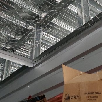 Public Storage - Roof of upstairs unit that was broken into by thieves and they gained access to many units this way at this facility. - Self Storage Near Me - Buena Park, California