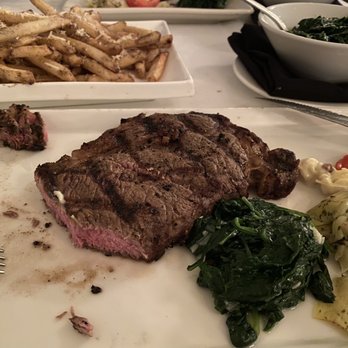 The Crystal Room - Boneless Ribeye, sides included sautéed spinach and truffle fries - New American Near Me - Bedford, Pennsylvania The Crystal Room - Boneless Ribeye, sides included sautéed spinach and truffle fries - New American Near Me - Bedford, Pennsylvania