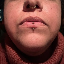Vertical labret done by Nash