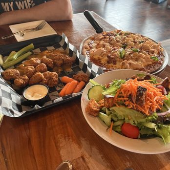Generations - Boneless wings, 12" pizza (The Boathouse), and half garden salad - New American Near Me - Lake Placid, New York Generations - Boneless wings, 12" pizza (The Boathouse), and half garden salad - New American Near Me - Lake Placid, New York