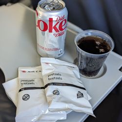 Air Canada - I got a full can of Diet Coke and two bags of mini pretzels. Charles, the flight attendant, was so nice.