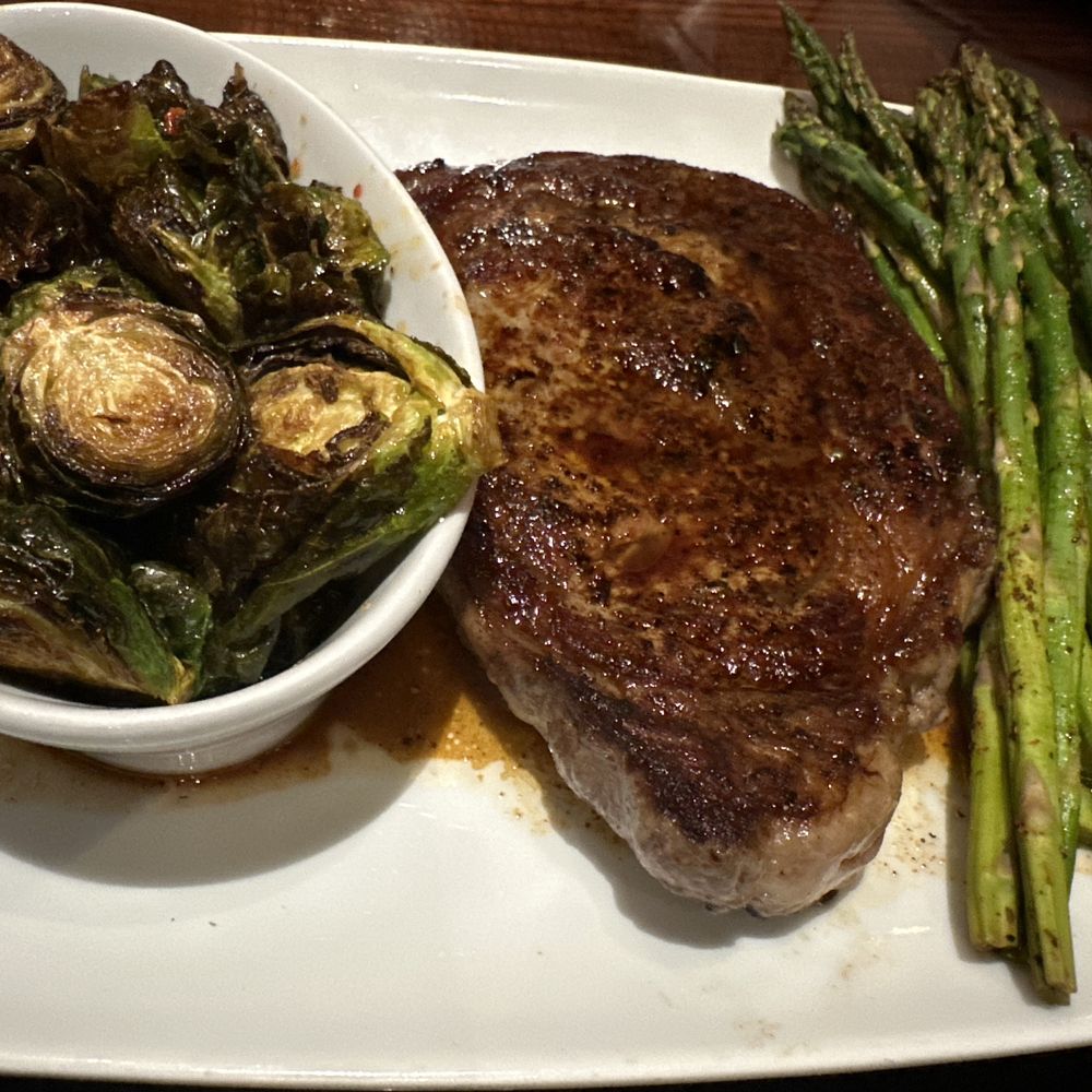 LongHorn Steakhouse - Ribeye Dinner w/ Brussel sprouts & Grilled Asparagus - Steakhouses Near Me - Olathe, Kansas LongHorn Steakhouse - Ribeye Dinner w/ Brussel sprouts & Grilled Asparagus - Steakhouses Near Me - Olathe, Kansas