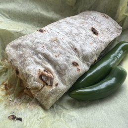 Chorizo with egg burrito and green chili hold the cabbage Chorizo with egg burrito and green chili hold the cabbage