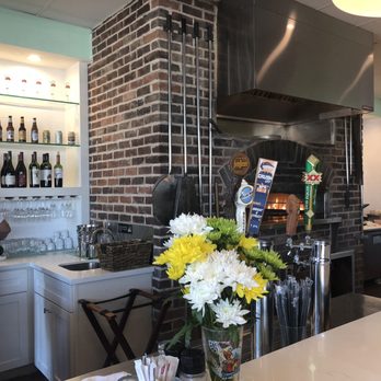 Ember & Greens - Bar area with pizza oven - New American Near Me - Houston, Texas