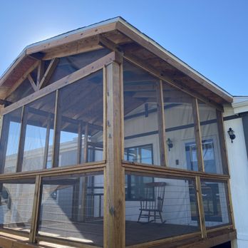 Lawrence Construction Services - This beautiful screened in porch provides a peaceful place for this family to relax outside in the shade.  Hire our contractor today. - Decks & Railing Near Me - Azle, Texas