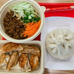 Pan fried kimchi dumps, 1- noodle bowl, 1- big bun Pan fried kimchi dumps, 1- noodle bowl, 1- big bun