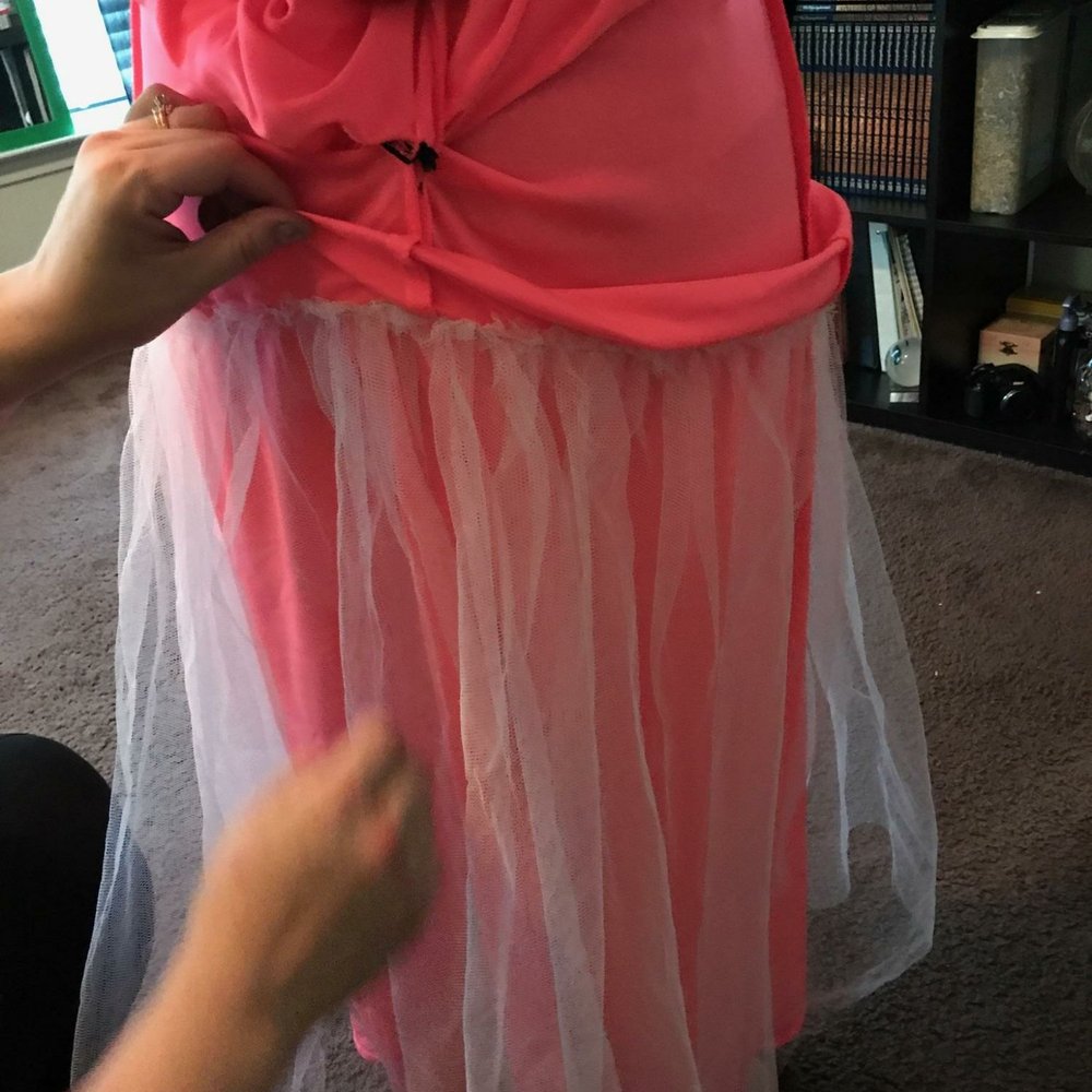 This is how they took 2 inches off a dress when I requested 2 inches to be cut and hemmed