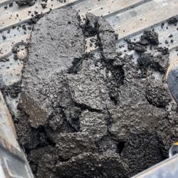 Ohana Pressure Washing - They pressure washed the loose gravel off the driveway and hauled it away leaving a fresh clean new layer of asphalt.