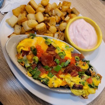 Scramblers Restaurant - Eye Opener side of potato chunks and yogurt - Breakfast & Brunch Near Me - Jacksonville, Florida