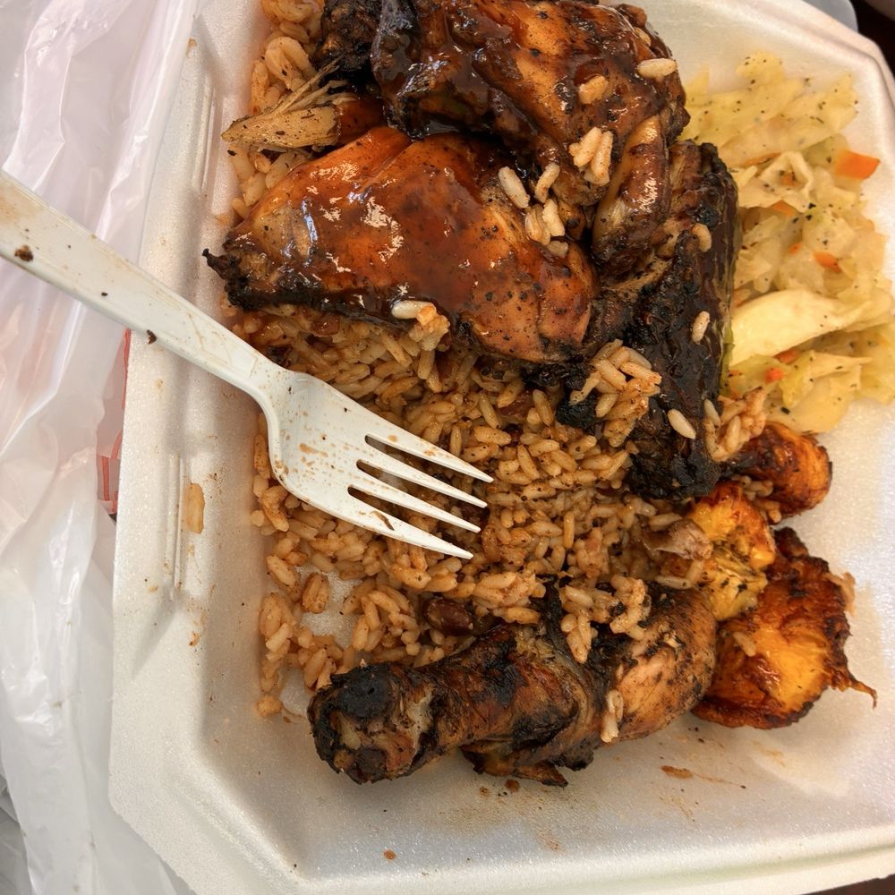 Just Jerk BBQ - Half eaten Large Jerk Chicken Plate - Caribbean Near Me - Jacksonville, Florida Just Jerk BBQ - Half eaten Large Jerk Chicken Plate - Caribbean Near Me - Jacksonville, Florida