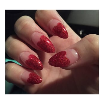 Lacquer Nails & Spa - Very red sparkly Heart shapes on tips of stiletto shaped nails - Nail Salons Near Me - Corona, California