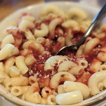 Monkeypod Kitchen - Boiled macaroni noodles with a plain tomato sauce, kids did not like it even covered in parmesan - New American Near Me - Lahaina, Hawaii