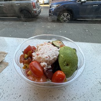 FOB Poke Bar- Seattle - Jasmine rice, avocado, cucumbers, fresh salmon, seared tuna, crab salad, seaweed, tomatoes, mango sauce. - Poke Near Me - Seattle, Washington FOB Poke Bar- Seattle - Jasmine rice, avocado, cucumbers, fresh salmon, seared tuna, crab salad, seaweed, tomatoes, mango sauce. - Poke Near Me - Seattle, Washington