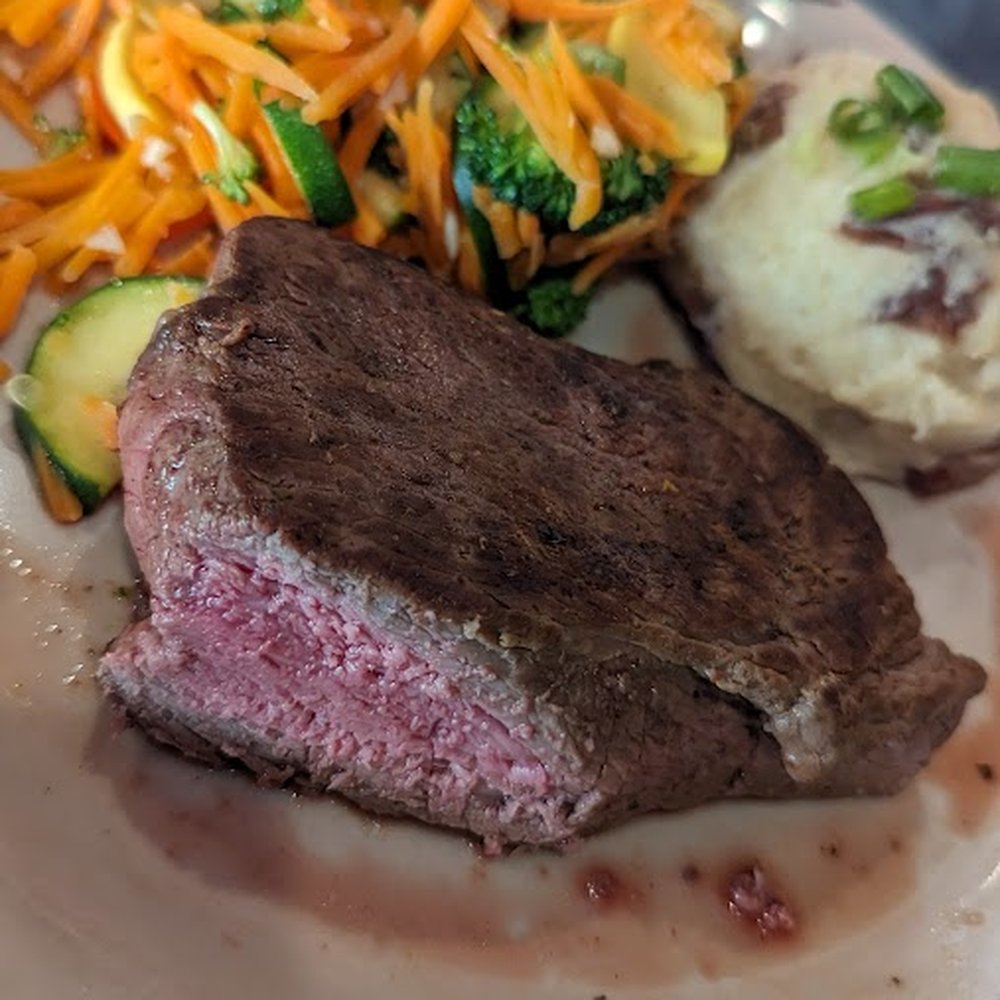 The steak was cooked perfectly to order with a nice seasoning. The steak was cooked perfectly to order with a nice seasoning.