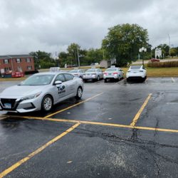 Top Driver Driving School - Plenty of vehicles to use, not a great look on the car over the yellow line.