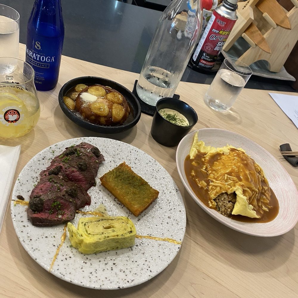 koko japanese pub - Brunch food! The banana fosters pancake, steak and eggs, and the omurice - Japanese Near Me - Cocoa Beach, Florida
