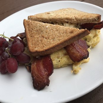 The Hotel Zamora - Breakfast sandwich with bacon on wheat toast. - Hotels Near Me - St. Pete Beach, Florida