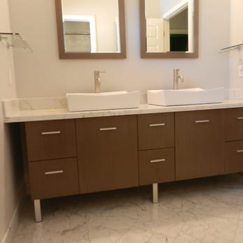 Innovative Construction & Design - a bathroom with double sinks - General Contractors Near Me Innovative Construction & Design - a bathroom with double sinks - General Contractors Near Me