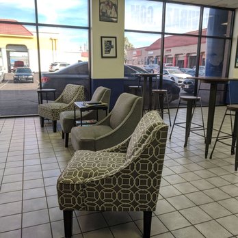 Arizona Bimmer Motor Werks - Very comfy chairs facing a big screen TV. Big windows that let lots of light in are an added bonus. - Auto Repair Near Me - Mesa, Arizona Arizona Bimmer Motor Werks - Very comfy chairs facing a big screen TV. Big windows that let lots of light in are an added bonus. - Auto Repair Near Me - Mesa, Arizona