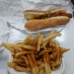 Hot dog and fries with gravy
