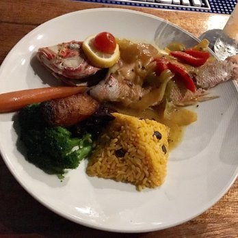 Mafolie Restaurant - Today's catch- red snapper with rice - Caribbean Near Me - Northside, Virgin Islands Mafolie Restaurant - Today's catch- red snapper with rice - Caribbean Near Me - Northside, Virgin Islands