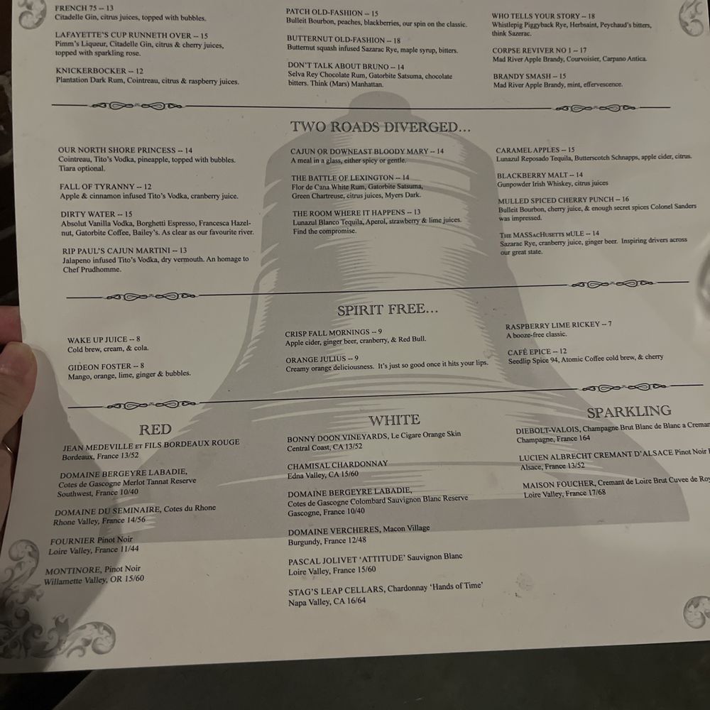 The Cellar - a hand holding a menu - Bars Near Me - Peabody, Massachusetts The Cellar - a hand holding a menu - Bars Near Me - Peabody, Massachusetts