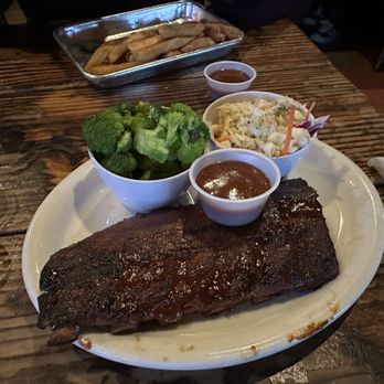 Pappy & Harriet’s - Half baby back ribs with seasonal veggie and cold slaw - Music Venues Near Me - Pioneertown, California