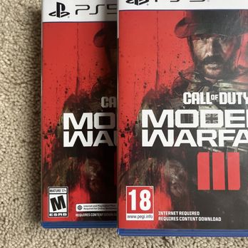 Walmart Supercenter - UK version of modern warfare 3 Vs US edition (underneath) - Department Stores Near Me - Renton, Washington