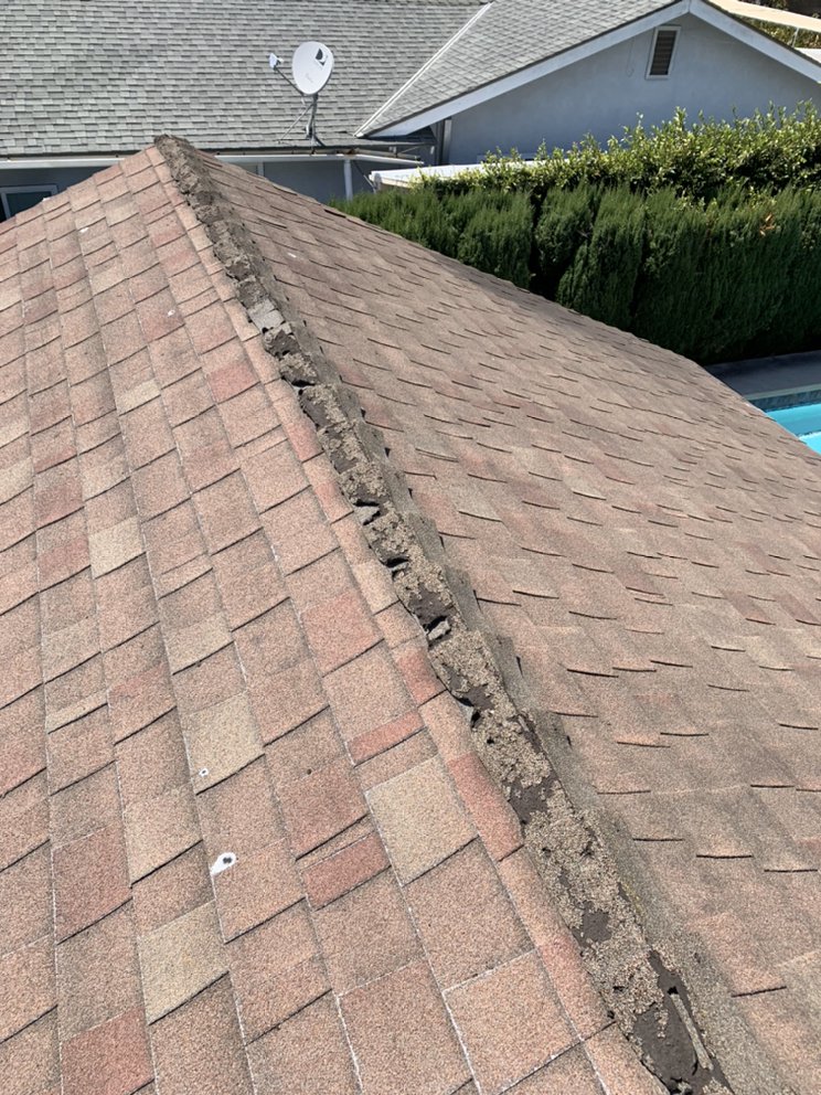 Slide of Century Roofing Company