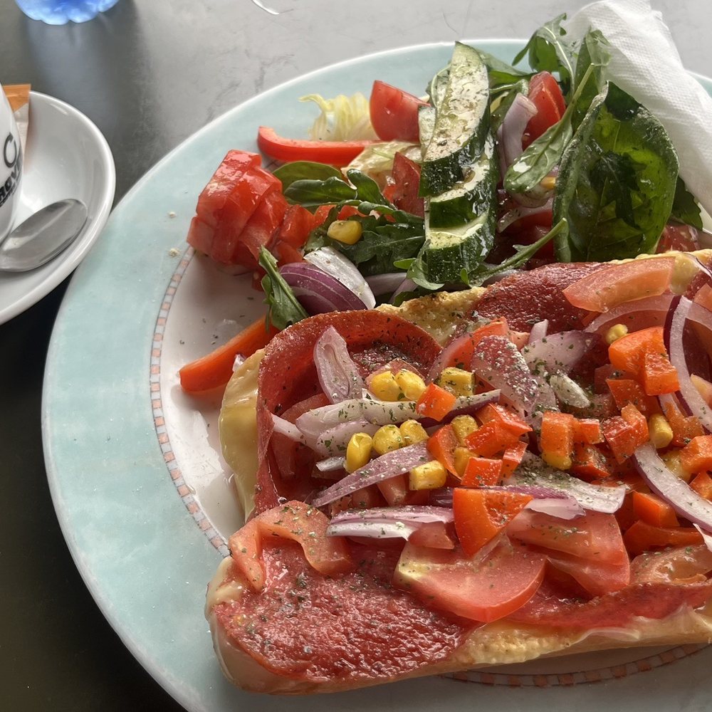 Coffee with salami, tomato, onion, cheese sandwich Coffee with salami, tomato, onion, cheese sandwich