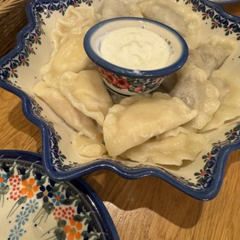 Mirror Bistro - Pierogi Bystro - Small bowl (16 pcs) of mixed fillings + garlic sauce - Pierogis Near Me - Kraków, Massachusetts Mirror Bistro - Pierogi Bystro - Small bowl (16 pcs) of mixed fillings + garlic sauce - Pierogis Near Me - Kraków, Massachusetts